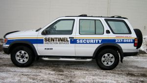 white sentinel security suv