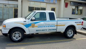 white sentinel security truck