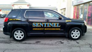 black sentinel security suv