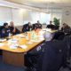 security guard meeting in large board room