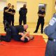 security guard training session grappling on the mat