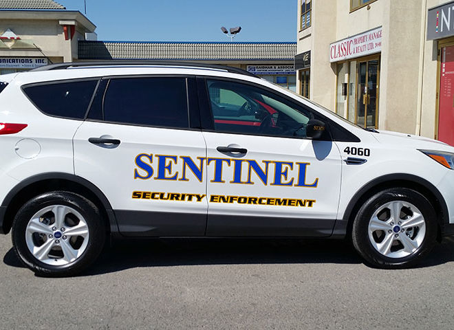 sentinel security white car 4060 side view