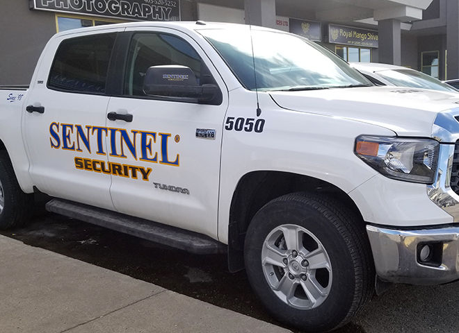 sentinel security white truck number 5050
